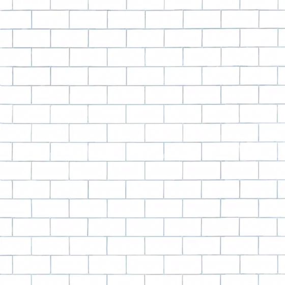 A plain wall of white bricks.